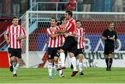 18 July 2013; Derry City's David McDaid, centre, celebrates with team-mates after scoring his side's first goal. UEFA Europa League Second Qualifying Round, 1st leg, Trabzonspor v Derry City, Huseyin Avni Aker Stadium, Trabzon, Turkey. Picture credit: SPORTSFILE