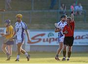 18 July 2013; Waterford's Paudie Prendergast is shown the red card by referee Johnny Ryan. Bord Gáis Energy Munster GAA Hurling Under 21 Championship Semi-Final, Clare v Waterford, Walsh Park, Waterford. Picture credit: Brian Lawless / SPORTSFILE