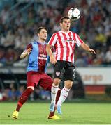 18 July 2013; David McDaid, Derry City, in action against Aykut Akgun, Trabzonspor. UEFA Europa League Second Qualifying Round, 1st leg, Trabzonspor v Derry City, Huseyin Avni Aker Stadium, Trabzon, Turkey. Picture credit: SPORTSFILE