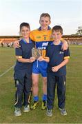 18 July 2013; Podge Collins, Clare, is presented with the Man of the Match award by Shane Whelan, age 12, from Ennis, Co. Clare, left, and Darragh Whelan, age 10, from Newmarket-On-Fergus, Co. Clare. Bord Gáis Energy Munster GAA Hurling Under 21 Championship Semi-Final, Clare v Waterford, Walsh Park, Waterford. Picture credit: Brian Lawless / SPORTSFILE