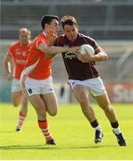 20 July 2013; Sean Armstrong, Galway, in action against Caolan Rafferty, Armagh. GAA Football All-Ireland Senior Championship, Round 3, Galway v Armagh, Pearse Stadium, Salthill, Galway. Picture credit: Ray Ryan / SPORTSFILE