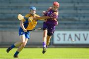20 July 2013; Fiona Kavanagh, Wexford, in action against Maire McGrath, Clare. Liberty Insurance Senior Camogie Championship Group 1, Wexford v Clare, Wexford Park, Wexford. Picture credit: David Maher / SPORTSFILE
