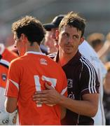 20 July 2013; Sean Armstrong, Galway, commiserates with Jamie Clarke, Armagh. GAA Football All-Ireland Senior Championship, Round 3, Galway v Armagh, Pearse Stadium, Salthill, Galway. Picture credit: Ray Ryan / SPORTSFILE