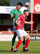 25 July 2021; Joshua Honohan of Cork City in action against Garry Buckley of Sligo Rovers during the FAI Cup First Round match between Sligo Rovers and Cork City at The Showgrounds in Sligo. Photo by Michael P Ryan/Sportsfile