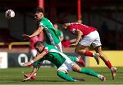 25 July 2021; Jordan Gibson of Sligo Rovers in action against Steven Beattie and Joshua Honohan of Cork City during the FAI Cup First Round match between Sligo Rovers and Cork City at The Showgrounds in Sligo. Photo by Michael P Ryan/Sportsfile