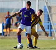 24 July 2021; Adam Foley of Finn Harps in action against AJ O'Conor of Fairview Rangers during the FAI Cup First Round match between Fairview Rangers and Finn Harps at Fairview Rangers AFC in Limerick. Photo by Michael P Ryan/Sportsfile