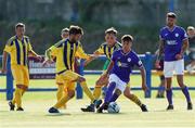 24 July 2021; Dan Hawkins of Finn Harps in action against Jeffrey Judge ,left, and AJ O'Conor of Fairview Rangers during the FAI Cup First Round match between Fairview Rangers and Finn Harps at Fairview Rangers AFC in Limerick. Photo by Michael P Ryan/Sportsfile