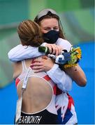 27 July 2021; Georgia Taylor-Brown is congratulated by Great Britain team-mate Jessica Learmonth, left, after finishing 2nd place, winning a silver medal, in the Women's Triathlon at the Odaiba Marine Park during the 2020 Tokyo Summer Olympic Games in Tokyo, Japan. Photo by Stephen McCarthy/Sportsfile