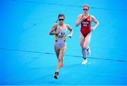 27 July 2021; Miriam Casillas Garcia of Spain, left, and Jolanda Annen of Switzerland in action during the Women's Triathlon at the Odaiba Marine Park during the 2020 Tokyo Summer Olympic Games in Tokyo, Japan. Photo by Stephen McCarthy/Sportsfile