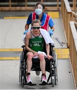 27 July 2021; Carolyn Hayes of Ireland is assisted by a medic after the Women's Triathlon at the Odaiba Marine Park during the 2020 Tokyo Summer Olympic Games in Tokyo, Japan. Photo by Stephen McCarthy/Sportsfile