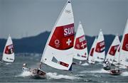 27 July 2021; Maud Jayet of Switzerland leads the field during the women's laser radial races at the Enoshima Yacht Harbour during the 2020 Tokyo Summer Olympic Games in Tokyo, Japan. Photo by Brendan Moran/Sportsfile