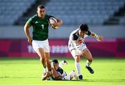 27 July 2021; Jordan Conroy of Ireland in action against Wanyong Park, left, and Yeon Sik Jeong of Republic of Korea during the Men's Rugby Sevens 9th place play-off match between Ireland and Republic of Korea at the Tokyo Stadium during the 2020 Tokyo Summer Olympic Games in Tokyo, Japan. Photo by Stephen McCarthy/Sportsfile