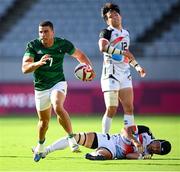 27 July 2021; Jordan Conroy of Ireland in action against Wanyong Park, left, and Yeon Sik Jeong of Republic of Korea during the Men's Rugby Sevens 9th place play-off match between Ireland and Republic of Korea at the Tokyo Stadium during the 2020 Tokyo Summer Olympic Games in Tokyo, Japan. Photo by Stephen McCarthy/Sportsfile