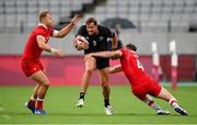 27 July 2021; Tim Mikkelson of New Zealand is tackled by Harry Jones, left, and Phil Berna of Canada during the Men's Rugby Sevens quarter-final match between New Zealand and Canada at the Tokyo Stadium during the 2020 Tokyo Summer Olympic Games in Tokyo, Japan. Photo by Stephen McCarthy/Sportsfile