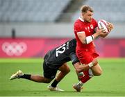 27 July 2021; Theo Sauder of Canada is tackled by Sione Molia of New Zealand during the Men's Rugby Sevens quarter-final match between New Zealand and Canada at the Tokyo Stadium during the 2020 Tokyo Summer Olympic Games in Tokyo, Japan. Photo by Stephen McCarthy/Sportsfile