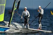 27 July 2021; Robert Dickson, right, and Sean Waddilove of Ireland react after victory in race 2 of the 49er Men at the Enoshima Yacht Harbour during the 2020 Tokyo Summer Olympic Games in Tokyo, Japan. Photo by Brendan Moran/Sportsfile