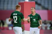 27 July 2021; Gavin Mullin, left, is congratulated by Ireland team-mate Hugo Lennox after scoring a try during the Men's Rugby Sevens 9th place play-off match between Ireland and Republic of Korea at the Tokyo Stadium during the 2020 Tokyo Summer Olympic Games in Tokyo, Japan. Photo by Stephen McCarthy/Sportsfile