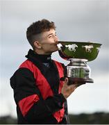 27 July 2021; Jockey Mikey Sheehy celebrates with the cup after winning the Colm Quinn BMW Mile Handicap on Sirjack Thomas during day two of the Galway Races Summer Festival at Ballybrit Racecourse in Galway. Photo by David Fitzgerald/Sportsfile