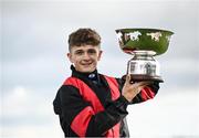 27 July 2021; Jockey Mikey Sheehy celebrates with the cup after winning the Colm Quinn BMW Mile Handicap on Sirjack Thomas during day two of the Galway Races Summer Festival at Ballybrit Racecourse in Galway. Photo by David Fitzgerald/Sportsfile