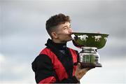 27 July 2021; Jockey Mikey Sheehy celebrates with the cup after winning the Colm Quinn BMW Mile Handicap on Sirjack Thomas during day two of the Galway Races Summer Festival at Ballybrit Racecourse in Galway. Photo by David Fitzgerald/Sportsfile