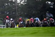 27 July 2021; Sirjack Thomas, with Mikey Sheehy up, left, lead the pack around the final bend on their way to winning the Colm Quinn BMW Mile Handicap during day two of the Galway Races Summer Festival at Ballybrit Racecourse in Galway. Photo by David Fitzgerald/Sportsfile
