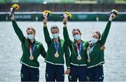 28 July 2021; Ireland rowers, from left, Aifric Keogh, Eimear Lambe, Fiona Murtagh and Emily Hegarty celebrate with their bronze medals after finishing 3rd place in the Women's Four final at the Sea Forest Waterway during the 2020 Tokyo Summer Olympic Games in Tokyo, Japan. Photo by Seb Daly/Sportsfile