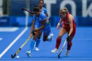 28 July 2021; Devi Sharmila of India in action against Lily Owsley of Great Britain during the women's pool A group stage match between Great Britain and India at the Oi Hockey Stadium during the 2020 Tokyo Summer Olympic Games in Tokyo, Japan. Photo by Brendan Moran/Sportsfile