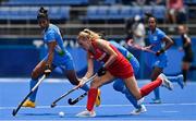 28 July 2021; Lily Owsley of Great Britain in action against Navneet Kaur, left, and Nisha of India during the women's pool A group stage match between Great Britain and India at the Oi Hockey Stadium during the 2020 Tokyo Summer Olympic Games in Tokyo, Japan. Photo by Brendan Moran/Sportsfile