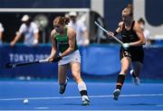 28 July 2021; Katie Mullan of Ireland in action against Franzisca Hauke of Germany during the women's pool A group stage match between Germany and Ireland at the Oi Hockey Stadium during the 2020 Tokyo Summer Olympic Games in Tokyo, Japan. Photo by Brendan Moran/Sportsfile