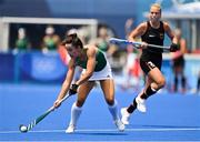 28 July 2021; Anna O'Flanagan of Ireland in action against Jette Fleschütz of Germany during the women's pool A group stage match between Germany and Ireland at the Oi Hockey Stadium during the 2020 Tokyo Summer Olympic Games in Tokyo, Japan. Photo by Brendan Moran/Sportsfile
