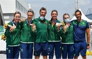 28 July 2021; Ireland Women's Four, from left, Aifric Keogh, Eimear Lambe, Fiona Murtagh and Emily Hegarty with Rowing Ireland high performance director Antonio Maurogiovanni, centre, and coach Giuseppe De Vita after finishing 3rd in the Women's Four final at the Sea Forest Waterway during the 2020 Tokyo Summer Olympic Games in Tokyo, Japan. Photo by Seb Daly/Sportsfile
