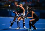 28 July 2021; Deirdre Duke of Ireland in action against Jette Fleschütz of Germany during the women's pool A group stage match between Germany and Ireland at the Oi Hockey Stadium during the 2020 Tokyo Summer Olympic Games in Tokyo, Japan. Photo by Brendan Moran/Sportsfile