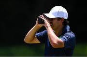 28 July 2021; Harry Diamond, caddie to Rory McIlroy, uses a rangefinder, during a practice round at the Kasumigaseki Country Club during the 2020 Tokyo Summer Olympic Games in Kawagoe, Saitama, Japan. Photo by Ramsey Cardy/Sportsfile