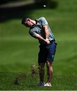 28 July 2021; Rory McIlroy of Ireland plays a shot from the rough on the 17th hole during a practice round at the Kasumigaseki Country Club during the 2020 Tokyo Summer Olympic Games in Kawagoe, Saitama, Japan. Photo by Ramsey Cardy/Sportsfile