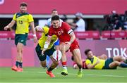 28 July 2021; Andrew Coe of Canada in action against Lachie Miller of Australia during the Men's Rugby Sevens 7th placed play-off match between Canada and Australia at the Tokyo Stadium during the 2020 Tokyo Summer Olympic Games in Tokyo, Japan. Photo by Ramsey Cardy/Sportsfile