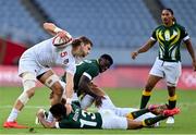28 July 2021; Joe Schroeder of United States is tackled by Ronald Brown of South Africa during the Men's Rugby Sevens 5th placed play-off match between USA and South Africa at the Tokyo Stadium during the 2020 Tokyo Summer Olympic Games in Tokyo, Japan. Photo by Ramsey Cardy/Sportsfile