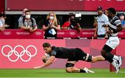 28 July 2021; Scott Curry of New Zealand scores his side's first try during the Men's Rugby Sevens gold medal match between Fiji and New Zealand at the Tokyo Stadium during the 2020 Tokyo Summer Olympic Games in Tokyo, Japan. Photo by Ramsey Cardy/Sportsfile