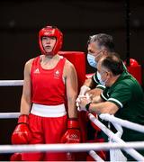 28 July 2021; Aoife O'Rourke of Ireland with coaches Zauri Antia, right, and Dmitry Dmitruk, centre, during her women's middleweight round of 16 bout against Qian Li of China at the Kokugikan Arena during the 2020 Tokyo Summer Olympic Games in Tokyo, Japan. Photo by Stephen McCarthy/Sportsfile