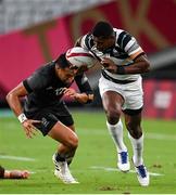 28 July 2021; Aminiasi Tuimaba of Fiji evades the tackle of Sione Molia of New Zealand during the Men's Rugby Sevens gold medal match between Fiji and New Zealand at the Tokyo Stadium during the 2020 Tokyo Summer Olympic Games in Tokyo, Japan. Photo by Ramsey Cardy/Sportsfile