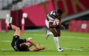 28 July 2021; Tim Mikkelson of New Zealand evades the tackle by Andrew Knewstubb of New Zealand during the Men's Rugby Sevens gold medal match between Fiji and New Zealand at the Tokyo Stadium during the 2020 Tokyo Summer Olympic Games in Tokyo, Japan. Photo by Ramsey Cardy/Sportsfile