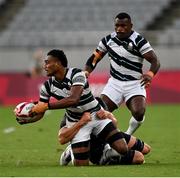 28 July 2021; Iosefo Masikau Baleiwairiki of Fiji is tackled by Amanaki Nicole of New Zealand during the Men's Rugby Sevens gold medal match between Fiji and New Zealand at the Tokyo Stadium during the 2020 Tokyo Summer Olympic Games in Tokyo, Japan. Photo by Ramsey Cardy/Sportsfile