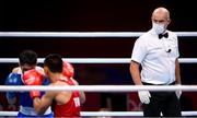 28 July 2021; Referee Diarmuid Mac Diarmada, from Newbridge, Kildare, during the men's featherweight round of 16 bout between Chatchai-Decha Butdee of Thailand and Mirco Jehiel Cuello of Argentina at the Kokugikan Arena during the 2020 Tokyo Summer Olympic Games in Tokyo, Japan. Photo by Stephen McCarthy/Sportsfile