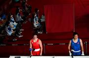 28 July 2021; Aoife O'Rourke of Ireland, left, and Qian Li of China after interviewed following their women's middleweight round of 16 bout at the Kokugikan Arena during the 2020 Tokyo Summer Olympic Games in Tokyo, Japan. Photo by Stephen McCarthy/Sportsfile