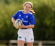 28 July 2021; Lexis Meredith, age 9, in action during the Bank of Ireland Leinster Rugby Summer Camp at Kilkenny RFC in Kilkenny. Photo by Matt Browne/Sportsfile