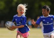 28 July 2021; Anna Maher, age 6, and Ethan Singh, age 7, in action during the Bank of Ireland Leinster Rugby Summer Camp at Kilkenny RFC in Kilkenny. Photo by Matt Browne/Sportsfile