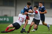 28 July 2021; Jake Darcy of North Midlands is tackled by Conor Moore, left, and Jack Bates of Midlands during the Shane Horgan Cup Round 1 match between Midlands and North Midlands at Energia Park in Dublin. Photo by Sam Barnes/Sportsfile