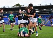 28 July 2021; Mark Cleary of Metro, centre, celebrates with team-mates after scoring his side's first try during the Shane Horgan Cup Round 1 match between Metro and South East at Energia Park in Dublin. Photo by Sam Barnes/Sportsfile