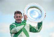 28 July 2021; Jockey Paul Townend celebrates with the plate after winning the Tote Galway Plate Steeplechase on Royal Rendezvous during day three of the Galway Races Summer Festival at Ballybrit Racecourse in Galway. Photo by David Fitzgerald/Sportsfile