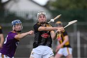 28 July 2021; Alan Dunphy of Kilkenny in action against Luke Murphy of Wexford during the 2021 Electric Ireland Leinster Minor Hurling Championship Final match between Kilkenny and Wexford at Netwatch Cullen Park in Carlow. Photo by Matt Browne/Sportsfile