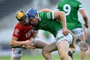 28 July 2021; Chris Thomas of Limerick is tackled by Daniel Hogan of Cork during the Munster GAA Hurling U20 Championship Final match between Cork and Limerick at Páirc Uí Chaoimh in Cork. Photo by Piaras Ó Mídheach/Sportsfile